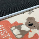Load image into Gallery viewer, Zoomed in koala illustration on a children's carpet with world map and animal designs on a white background
